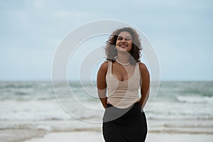 Young woman seen by the beach
