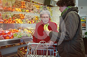 Young woman and senior woman in the supermarket