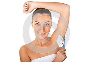 Young Woman Shaving Armpits photo