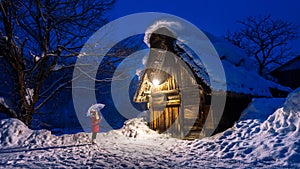 Young woman in Shirakawa-go village in winter, UNESCO world heritage sites, Japan