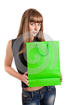 Young woman with shopping bag in her hands