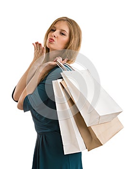 Young woman with shopping bags isolated