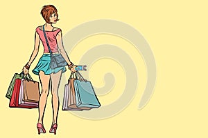 Young woman with shopping bags on sale