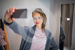 Young woman shopping in a fashion store