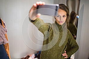 Young woman shopping in a fashion store