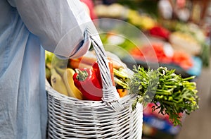 Young woman shopping healthy food on the market