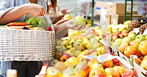 Young woman shopping healthy food on the market