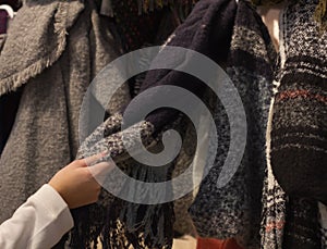 A young woman Shopping a new scarf