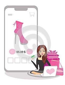 Young woman shopping online with credit card, phone and laptop