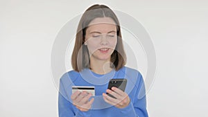 Young Woman Shopping Online via Phone on White Background