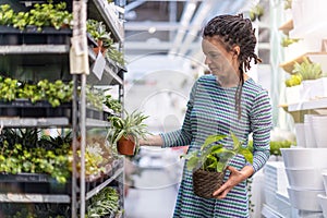 Woman shopping in plant store photo