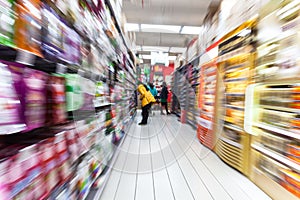 Young woman shopping in the supermarket