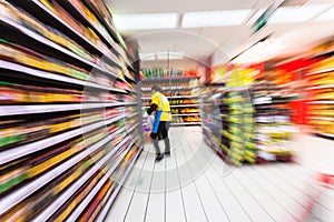 Young woman shopping in the supermarket