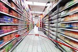 Young woman shopping in the supermarket