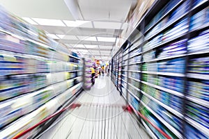 Young woman shopping in the supermarket