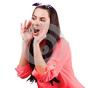 Young woman shout and scream using her hands as tube