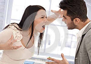 Young woman shouting at boyfriend