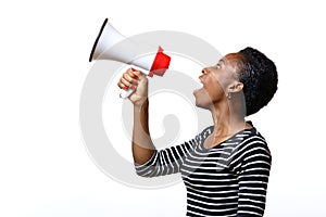 Young woman shouting into a megaphone