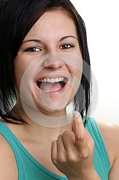 young woman show with her fingertip photo