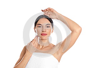 Young woman showing hairy armpit on white. Epilation procedure photo