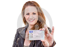 Young woman showing her driver's license