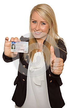 Young woman showing her driver's license