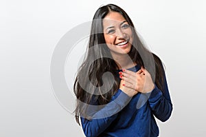 Young woman showing her heartfelt gratitude photo