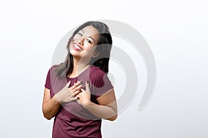 Young woman showing her heartfelt gratitude photo