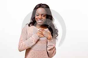 Young woman showing her heartfelt gratitude photo