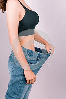 A young woman showing off a slim figure Exercise regularly.