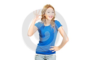 Young woman showing perfect sign.