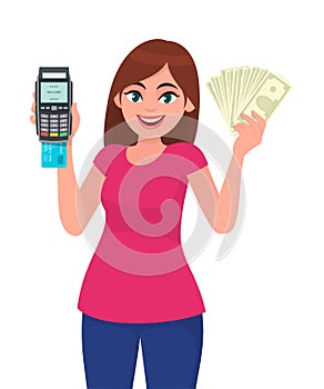 Young woman showing pos terminal or credit/debit cards swiping machine and holding cash/money/currency notes. Wireless modern bank