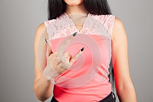 young woman showing rock sign