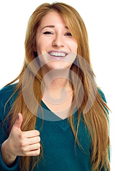 Young woman is showing thumb up gesture