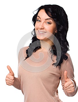 Young woman is showing thumb up gesture
