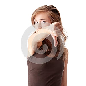 Young woman showing thumbs down