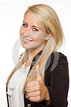 Young woman showing thumbs up with her hands