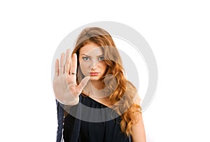 Young woman shows banning hand gesture