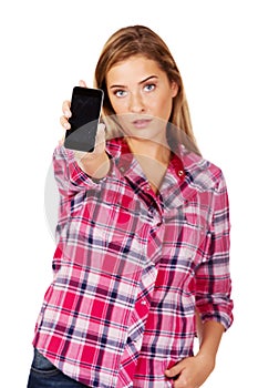 Young woman shows broken mobile phone