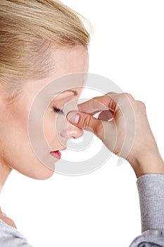 Young woman with sinus pressure pain photo