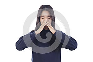 Young woman with sinus pressure pain isolated on white background