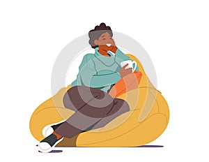 Young Woman Sit on Bean Bag with Cup of Tea or Coffee in Hand at Home. Female Character Visiting Friend, Having Leisure photo