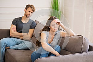Young woman sit looking offended after a bad talk with her husband
