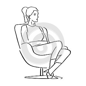 Young woman sitting in armchair in a closed pose.