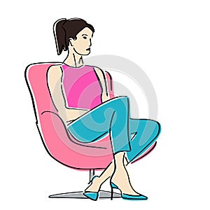 Young woman sitting in armchair in a closed pose.