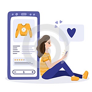 Young woman is sitting behind big phone and shopping online. Choosing an apparel in mobile app, buying in the internet store.