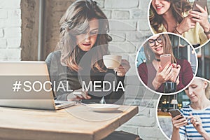 Young woman sitting in coffee shop at wooden table, drinking coffee and using smartphone.On table is laptop.