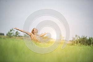 Young woman sitting feel good