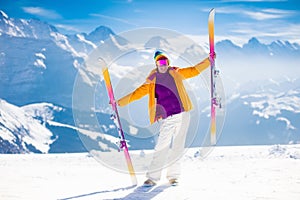 Young woman skiing in the mountains.