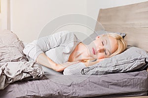 Young Woman Sleeping In Bed